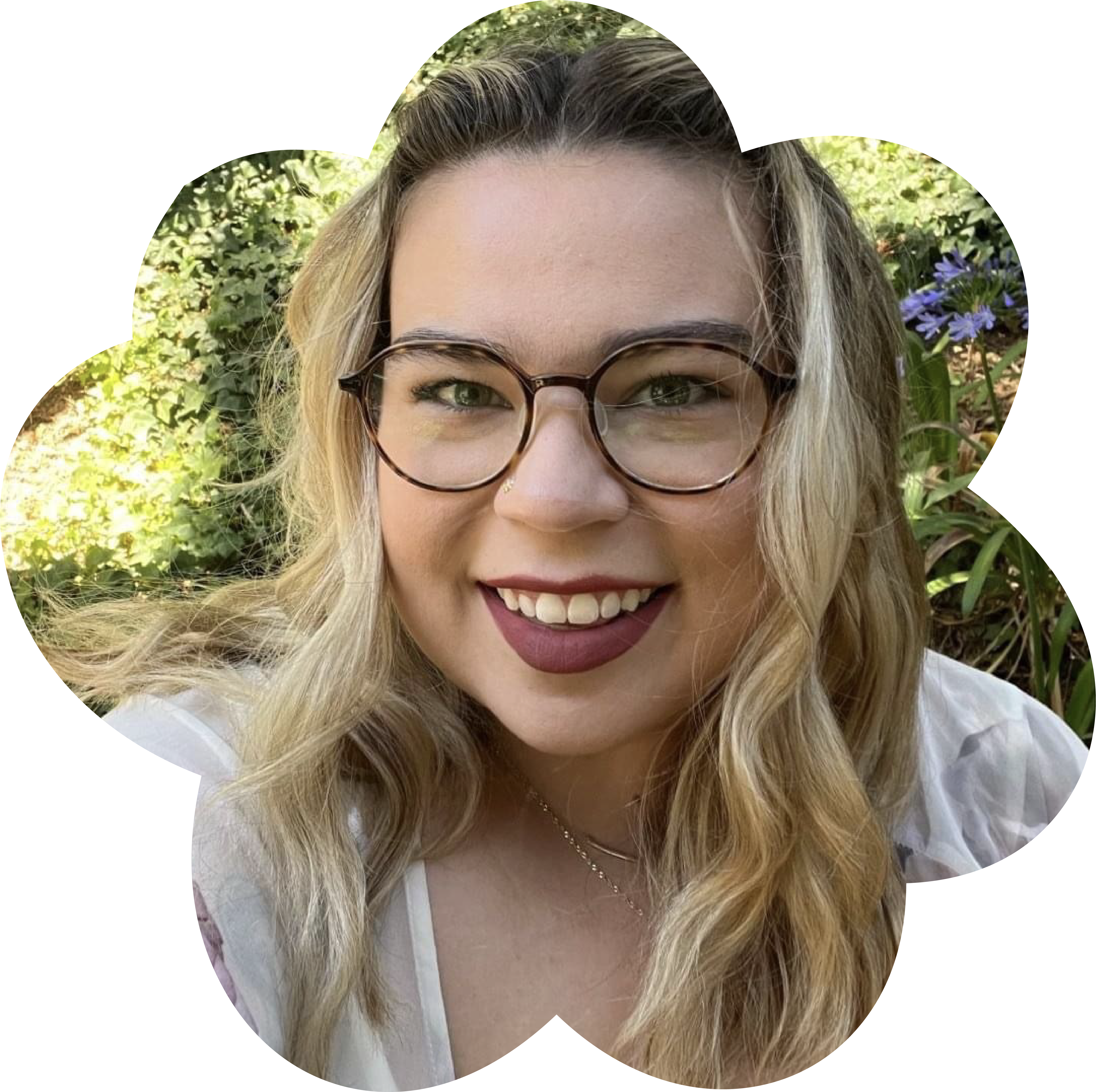 Image of a blond female presenting person who is a queer birth and postpartum doula